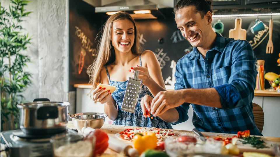 millennials cooking dinner athome to save money to become millionaires